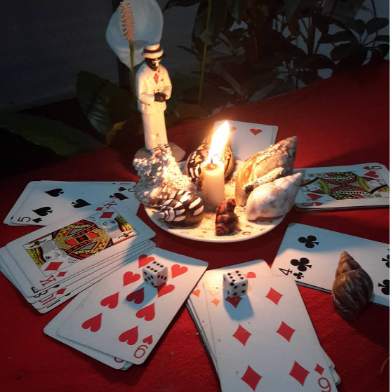 Consulta com dados, cartas e dominó seu Zé Pelintra
